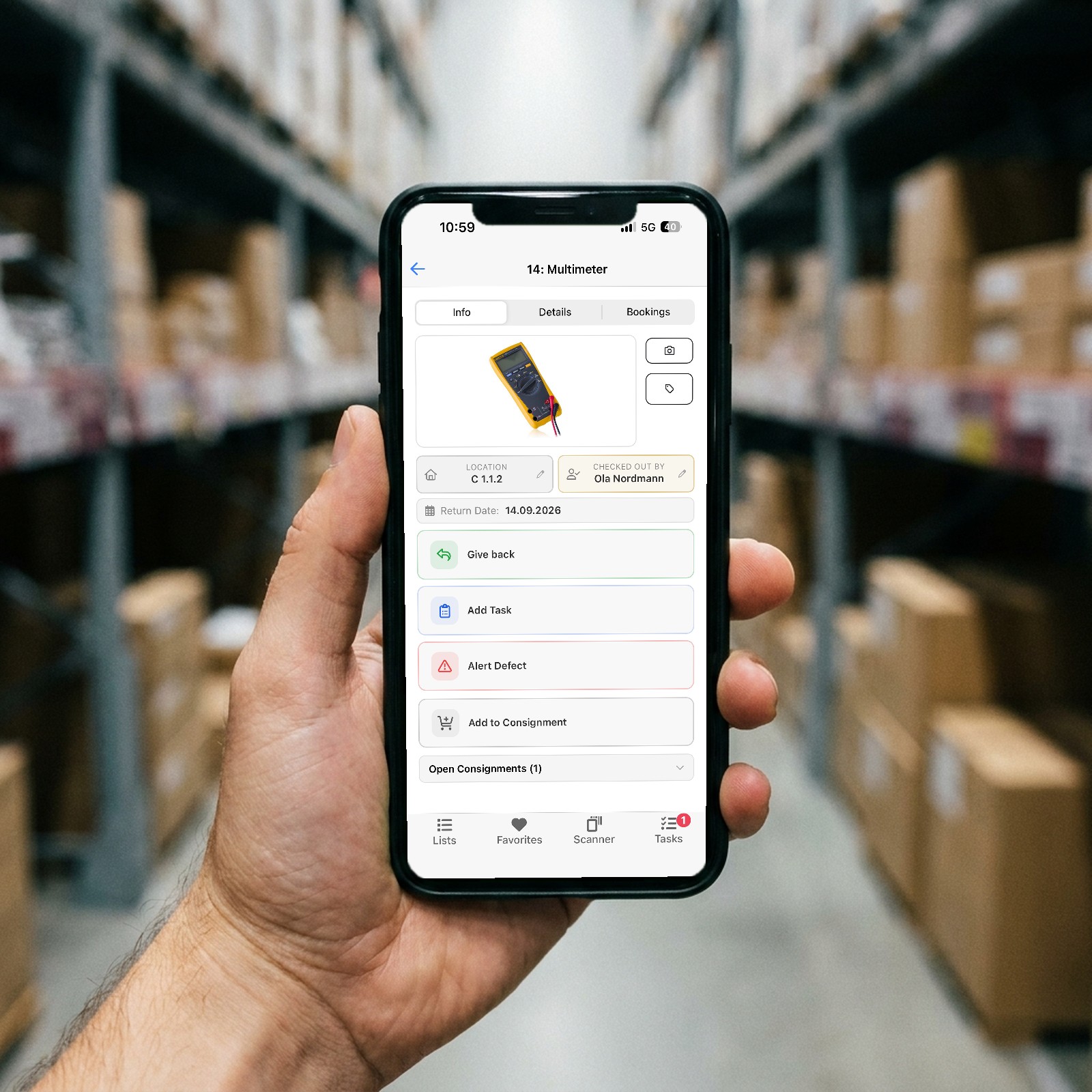 The AlmacénOS app on a phone in the warehouse